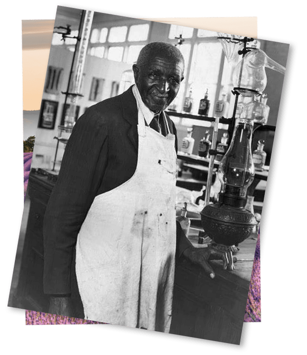 George Washington Carver standing in front of a table