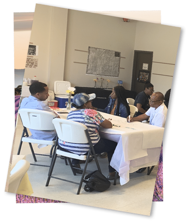 a group of people sitting at a table