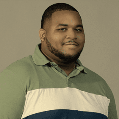 a man in a green shirt