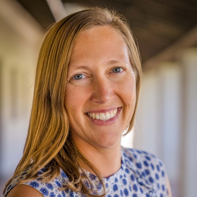 a woman smiling for the camera