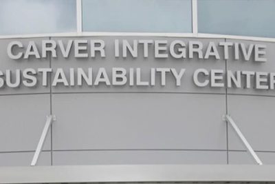 A Sign In Front Of A Building