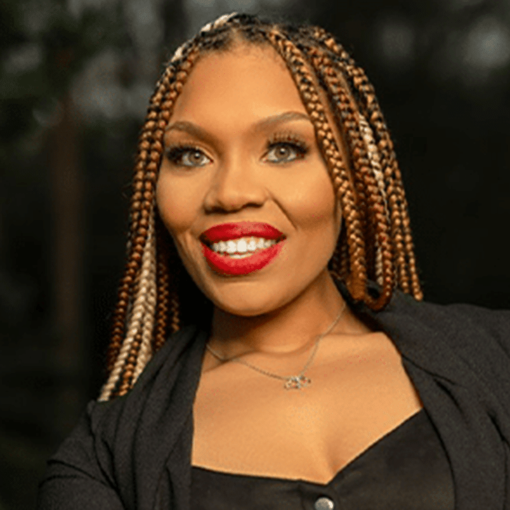 a woman who is smiling and looking at the camera
