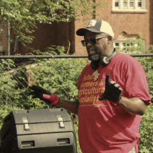 A Man Holding A Suitcase